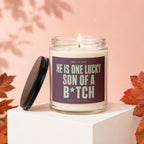 Candle with text "He is one lucky son of a B*tch" on label.