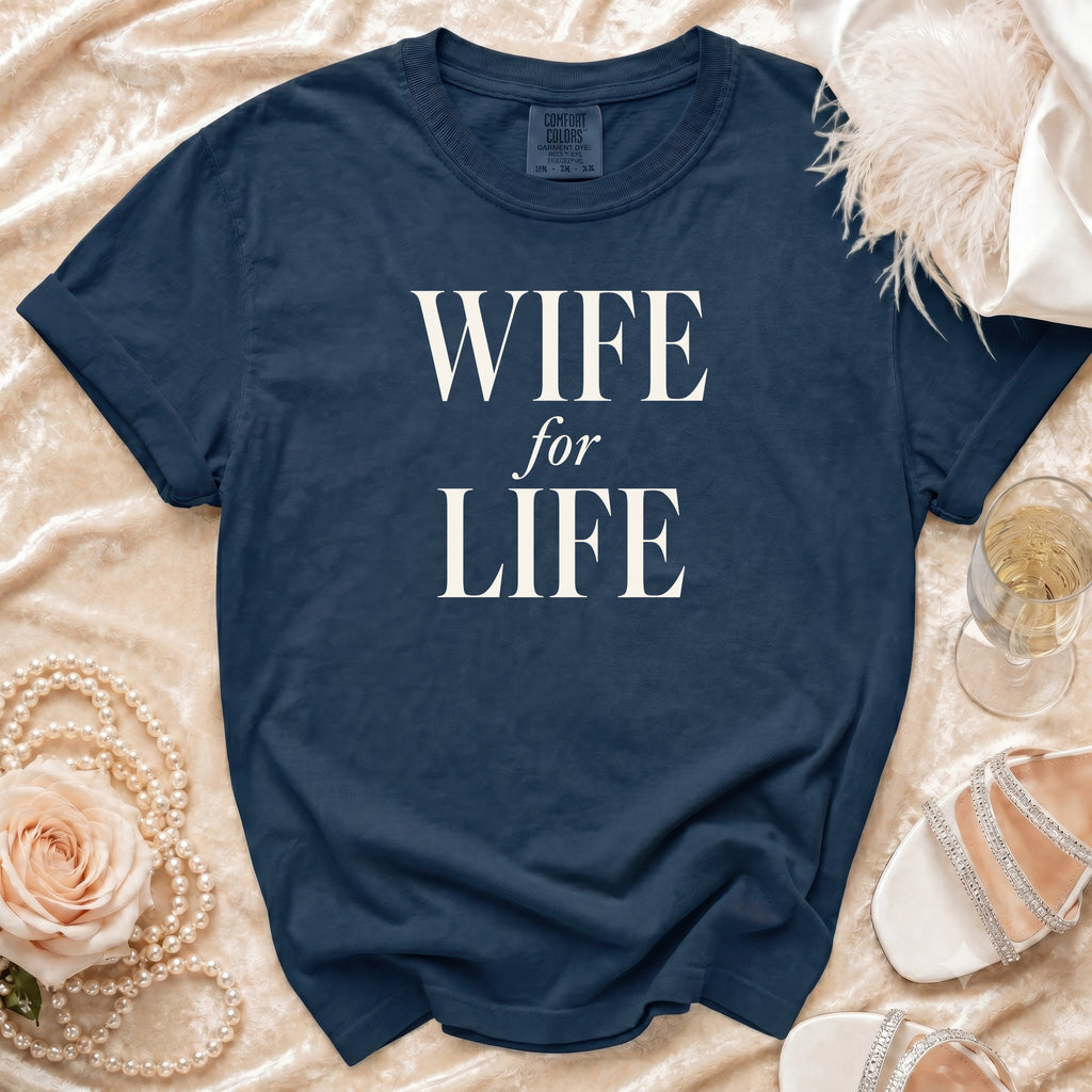 Navy blue t-shirt with "WIFE for LIFE" text, surrounded by decorative items.