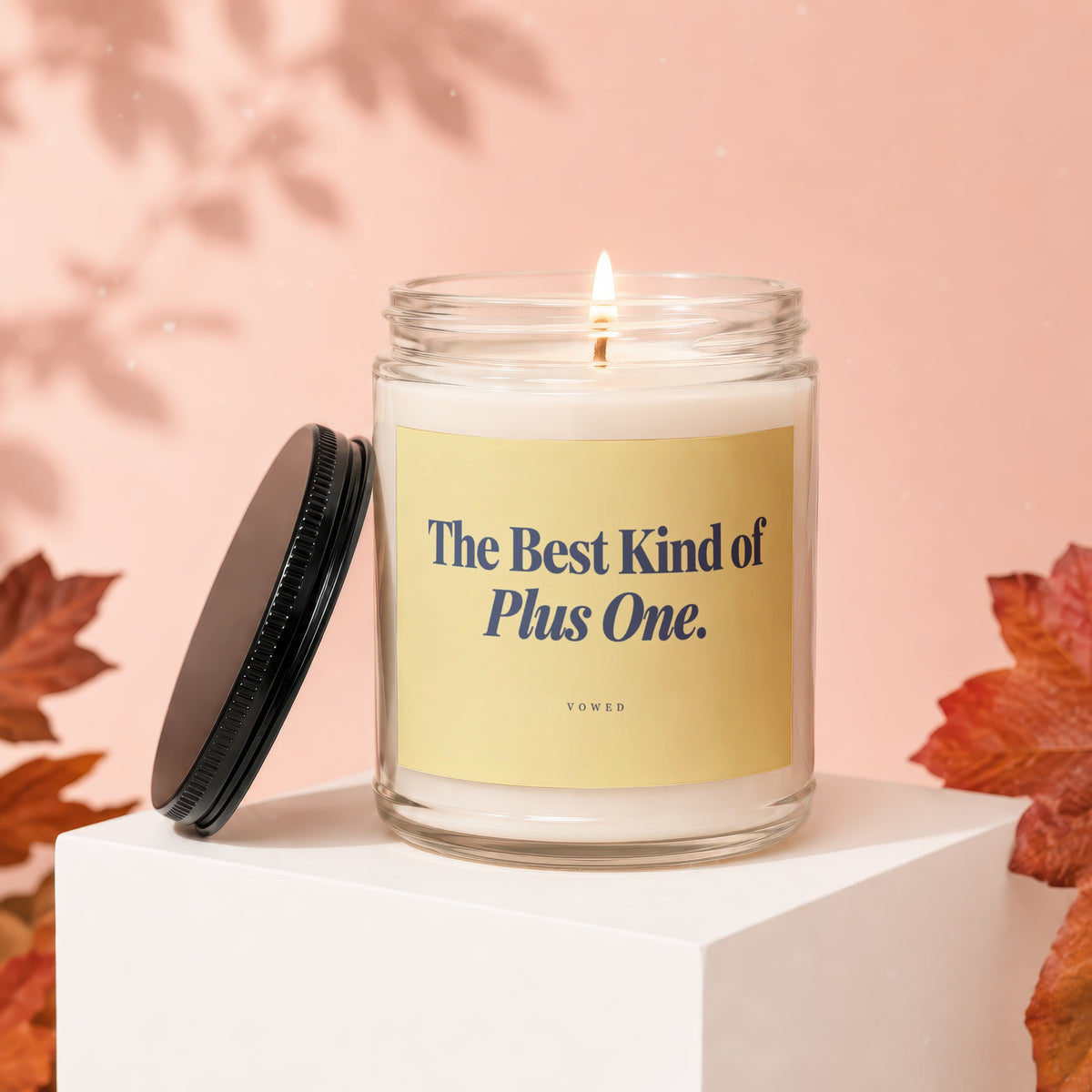 Candle with text "The Best Kind of Plus One." and "VOWED".