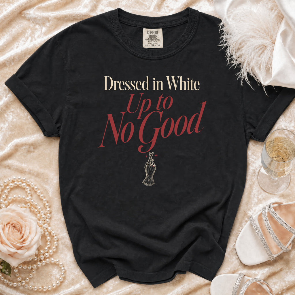 Black Comfort Colors t-shirt with "Dressed in White Up to No Good" graphic.