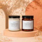 Two candles with labels reading "smells like a bridesmaid dress you'll wear once".