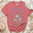 T-shirt with "Reckless in Texas Olivia's Bach" text, disco ball, and cowboy boots.