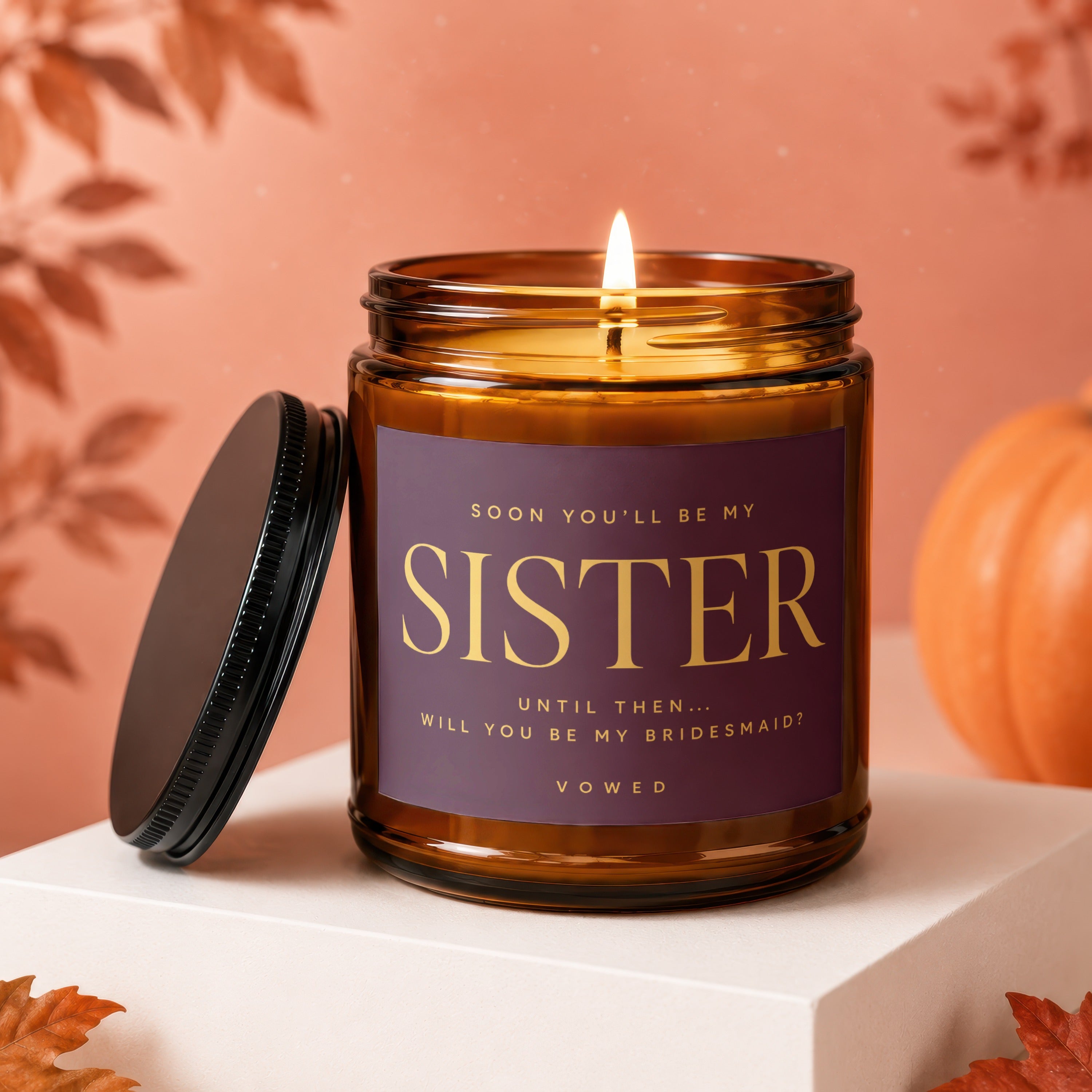 Candle asking "Will you be my bridesmaid?" with "SISTER" prominently displayed.