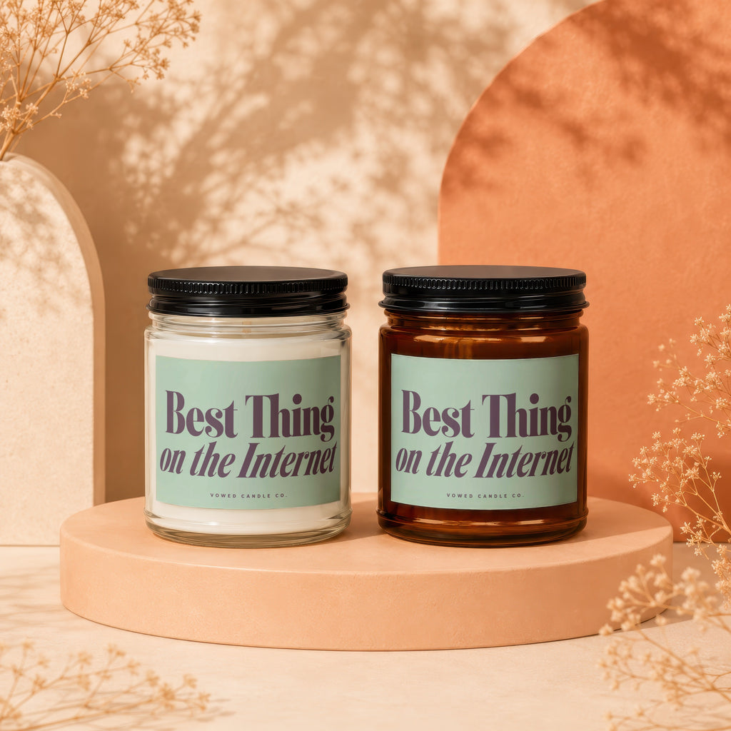 Two candles with "Best Thing on the Internet" text on labels.