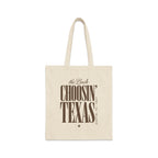 Off-white canvas tote bag featuring brown text that reads the Bach Choosin' Texas Austin, TX 2027.