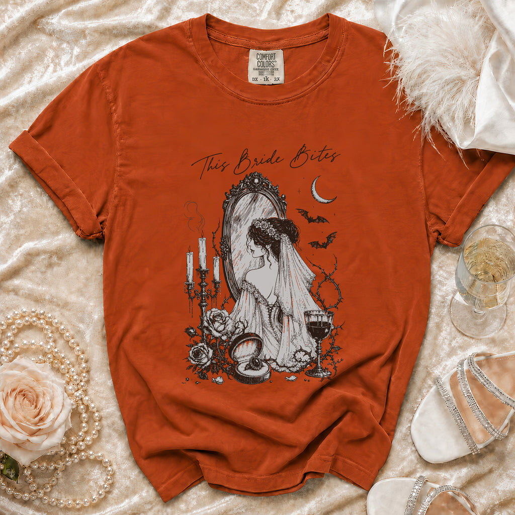 Orange t-shirt with "This Bride Bites" text and gothic bride graphic.