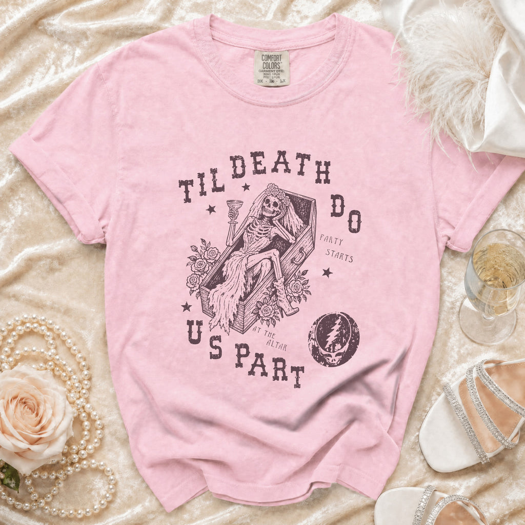Pink t-shirt with skeleton bride in coffin graphic, "Til Death Do Us Part" text.