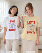 Bride and crew toasting in the The Bride & Let's Pawty Dog bachelorette shirts