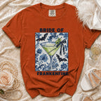 Orange t-shirt with "Bride of Frankenfine" text and martini glass graphic.