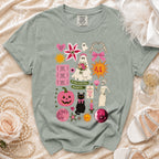 T-shirt with ghost bride, cat, skeleton, pumpkin, and "if the veil fits, haunt it" text.