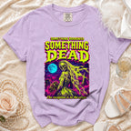 Purple t-shirt with "Something Borrowed Something Dead" skull bride graphic and crypt text.