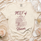 Cream t-shirt with "MILF of Honor" text and outline graphic of a bouquet, tiara, and heels.