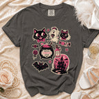 Dark grey t-shirt with Halloween-themed cat, ghost, bat, and haunted house graphics.