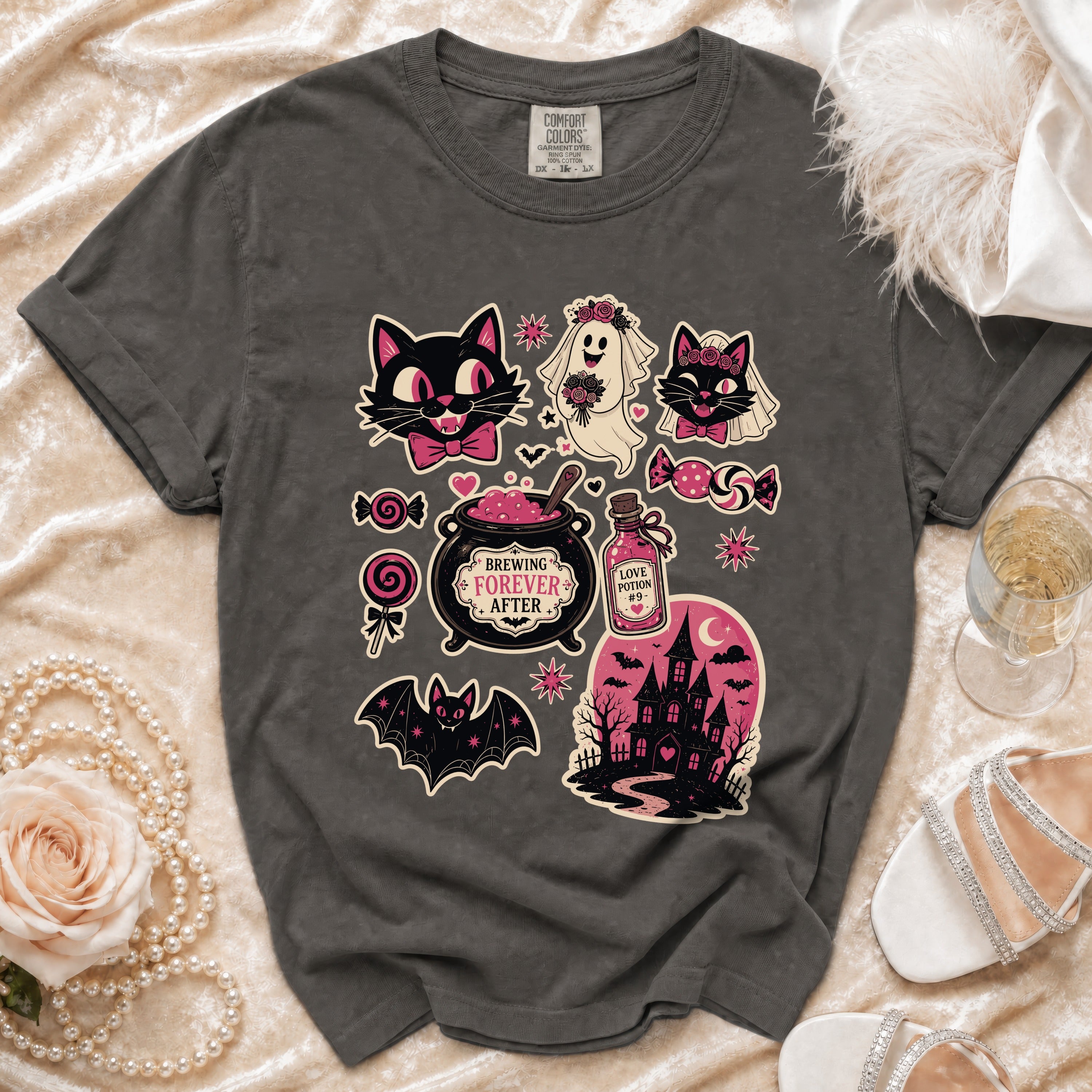 Dark grey t-shirt with Halloween-themed cat, ghost, bat, and haunted house graphics.