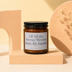 Amber glass candle with black lid, label reads "Of All the Internet Weirdos, You're My Favorite."