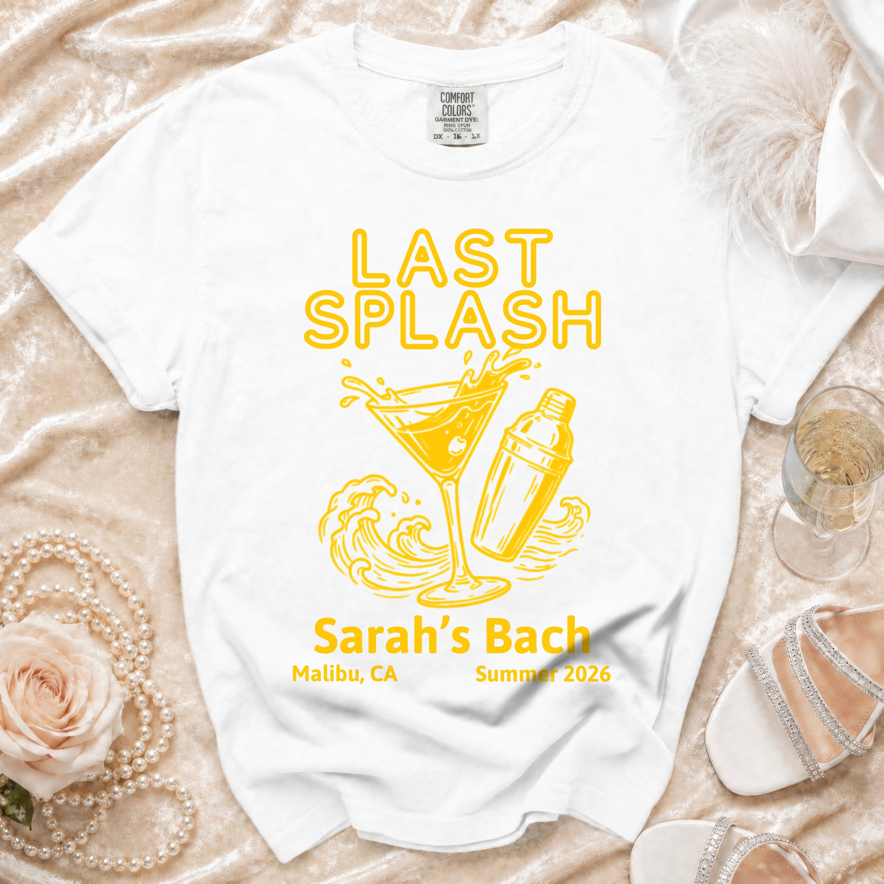 White t-shirt with "LAST SPLASH Sarah's Bach Malibu, CA Summer 2026" text.