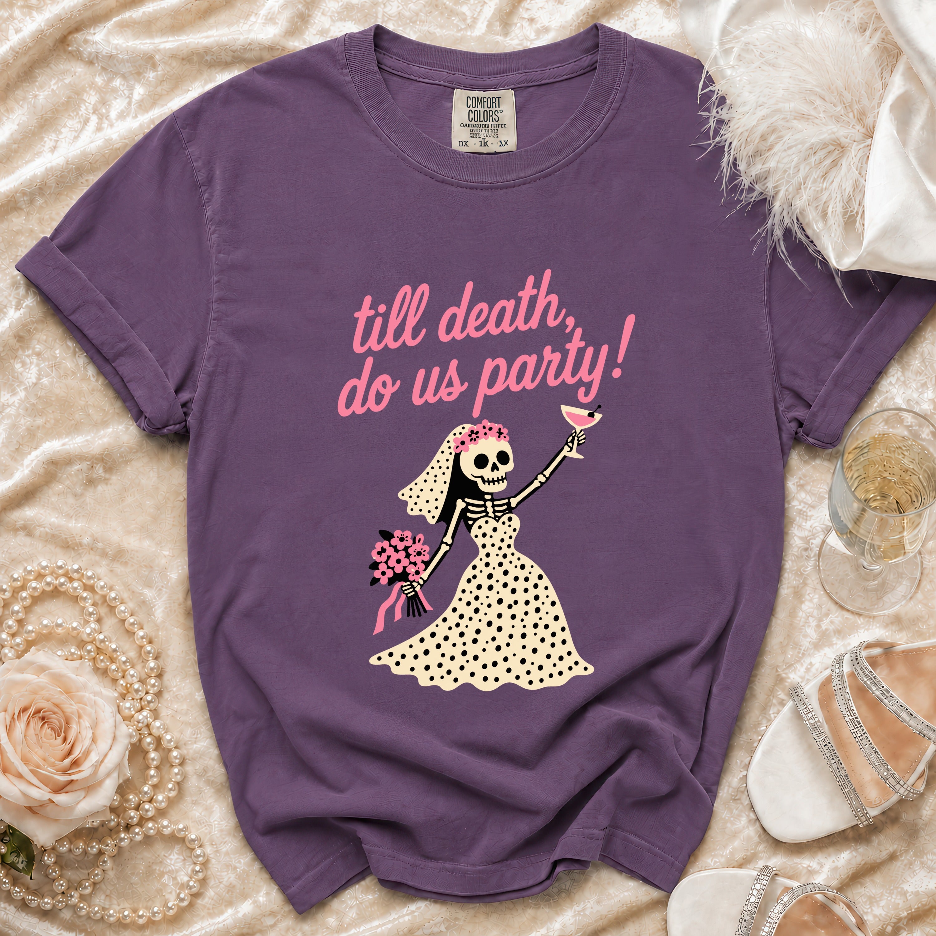 Purple t-shirt with skeleton bride and "till death, do us party!" text.