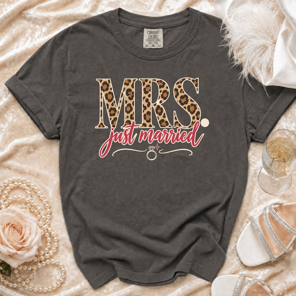 Grey t-shirt with "MRS just married" text, leopard print, and wedding accessories.