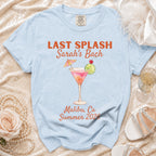 Light blue t-shirt with "Last Splash Sarah's Bach" and cocktail graphic.