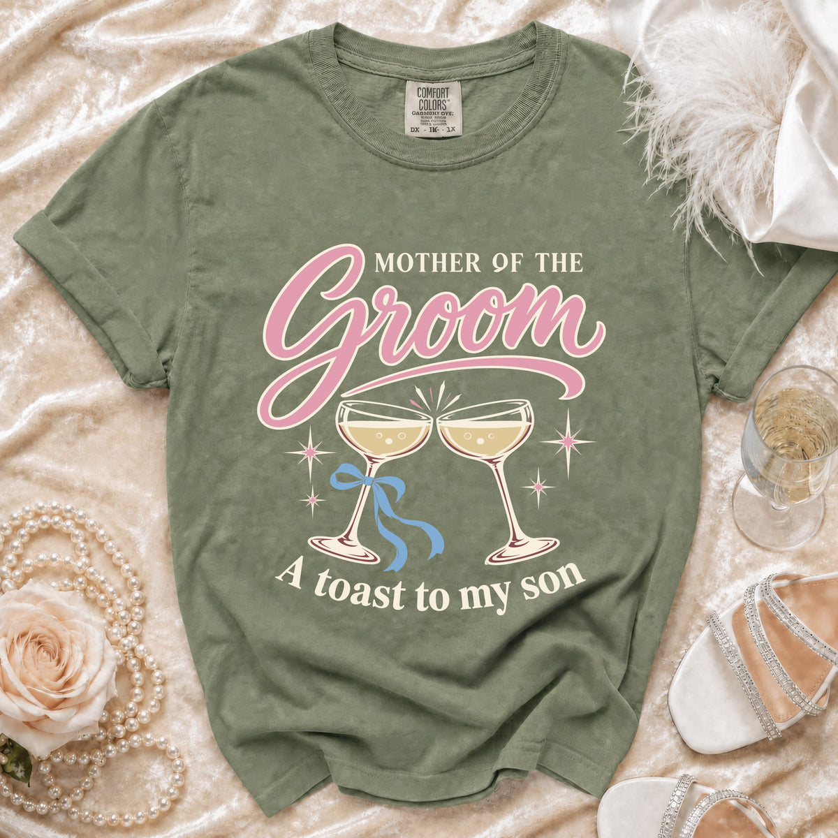 Green t-shirt with "Mother of the Groom" text, champagne glasses, and "A toast to my son."