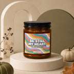 Amber glass candle with "Be Still, My Heart! You're Engaged!" label.