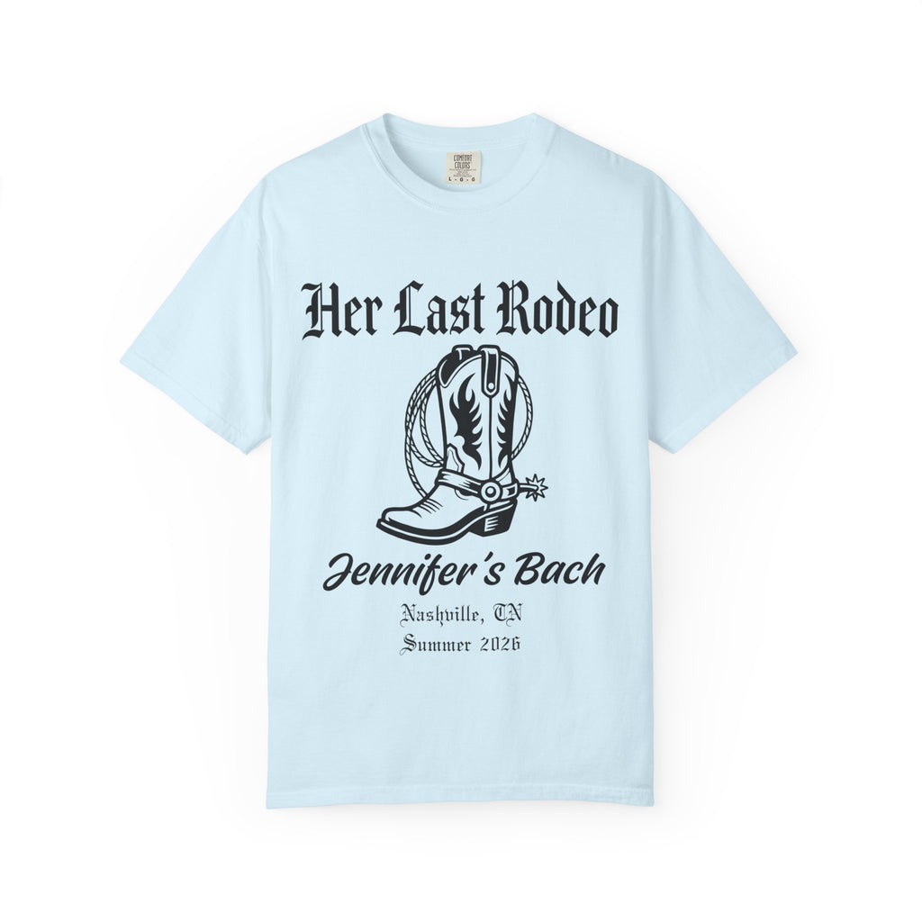 Light blue t-shirt with "Her Last Rodeo" and cowboy boot graphic.