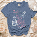 Blue t-shirt with "This is How I Maid of Honor I Plan, You Panic" text and graphics.