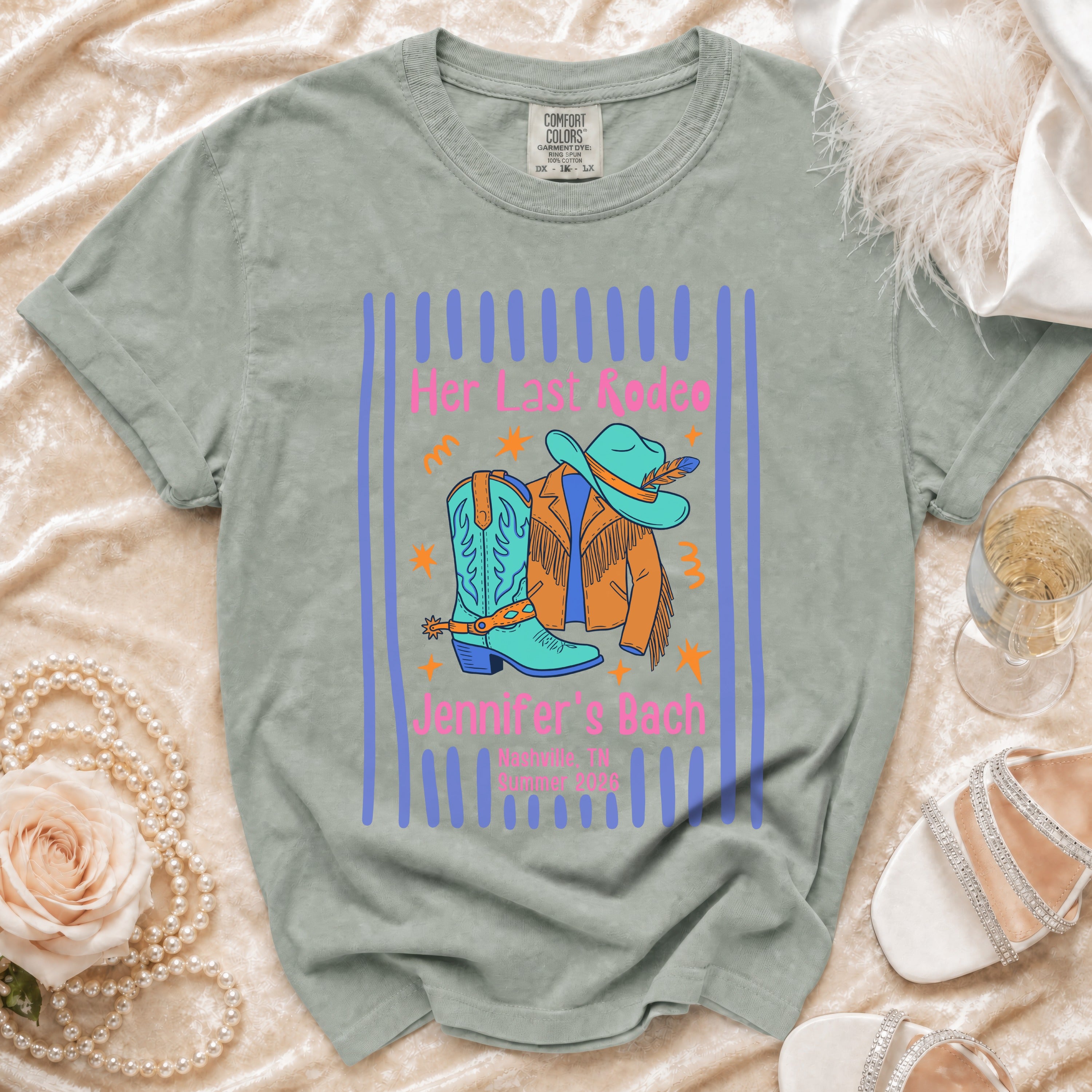 Bachelorette t-shirt with cowboy boots, hat, jacket, and text.