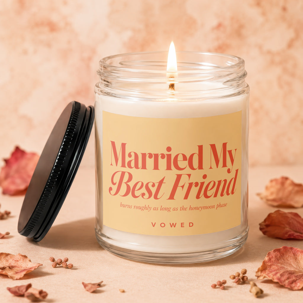Scented candle with text "Married My Best Friend" and "VOWED".