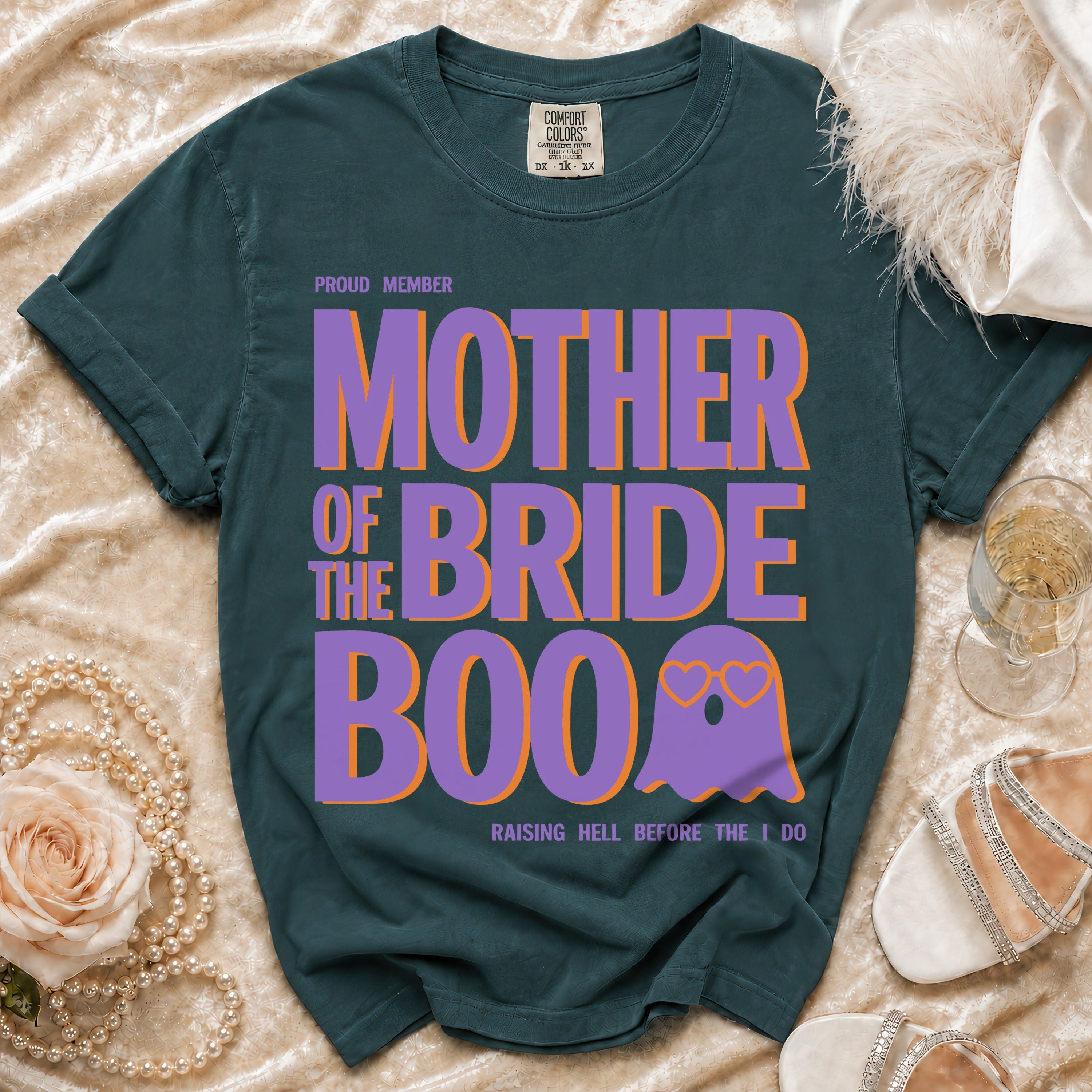 Proud Mother of the Bride Boo shirt with ghost graphic and "Raising Hell" text.