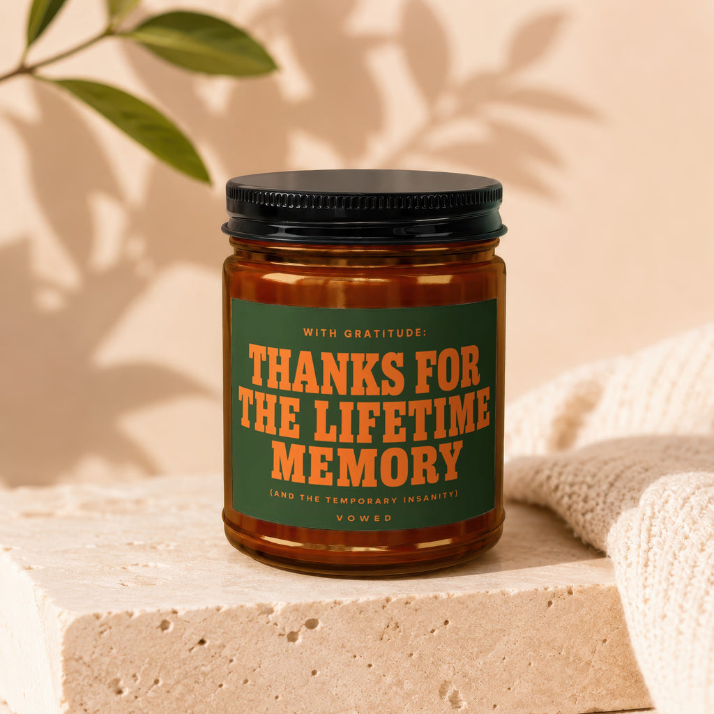 Amber jar candle with green label, "Thanks for the Lifetime Memory" text.