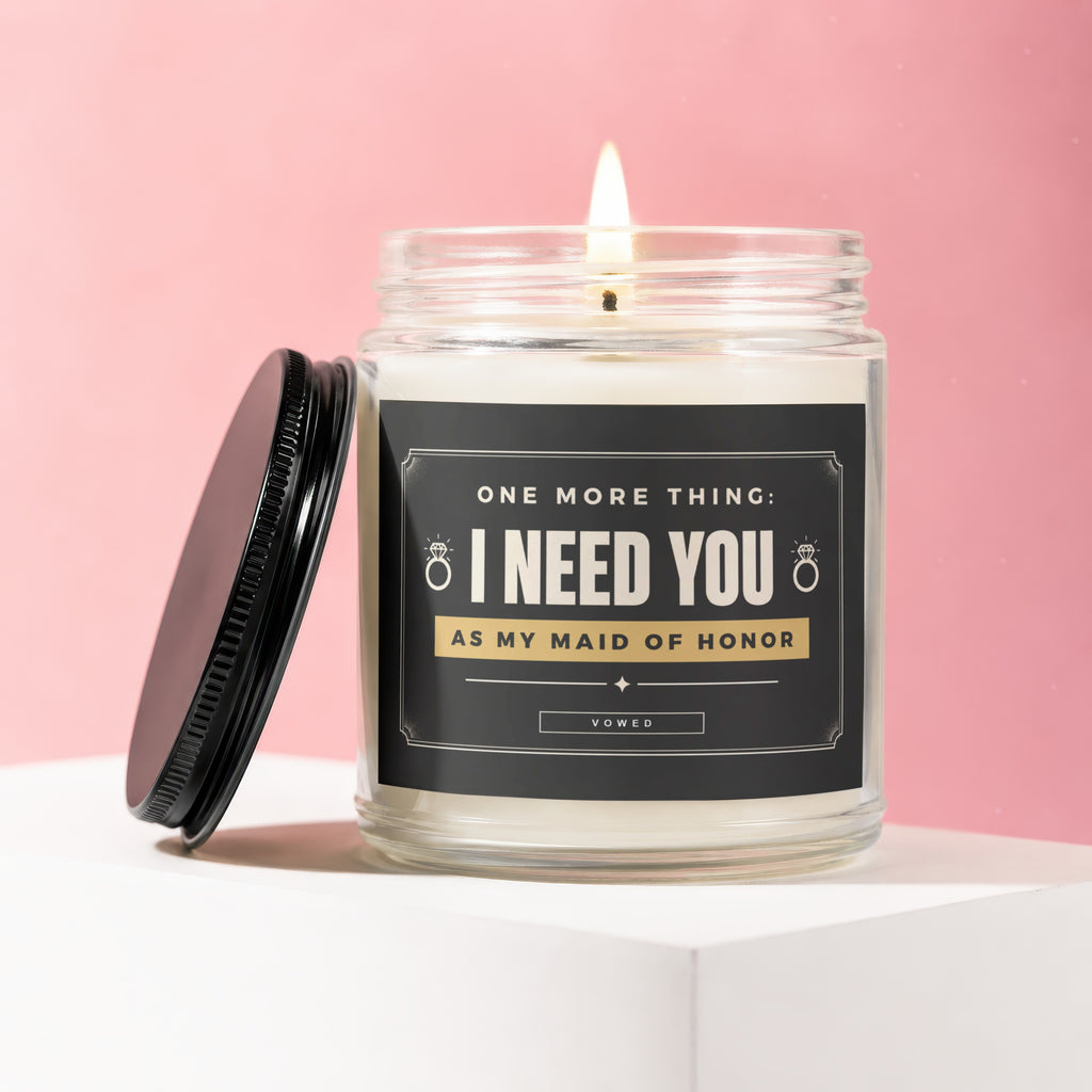 Candle with label reading "I NEED YOU AS MY MAID OF HONOR".