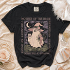 Black t-shirt with ghost in witch hat holding coffee, "Mother of the Bride" text.