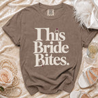 Brown t-shirt with "This Bride Bites" text and a diamond ring graphic.