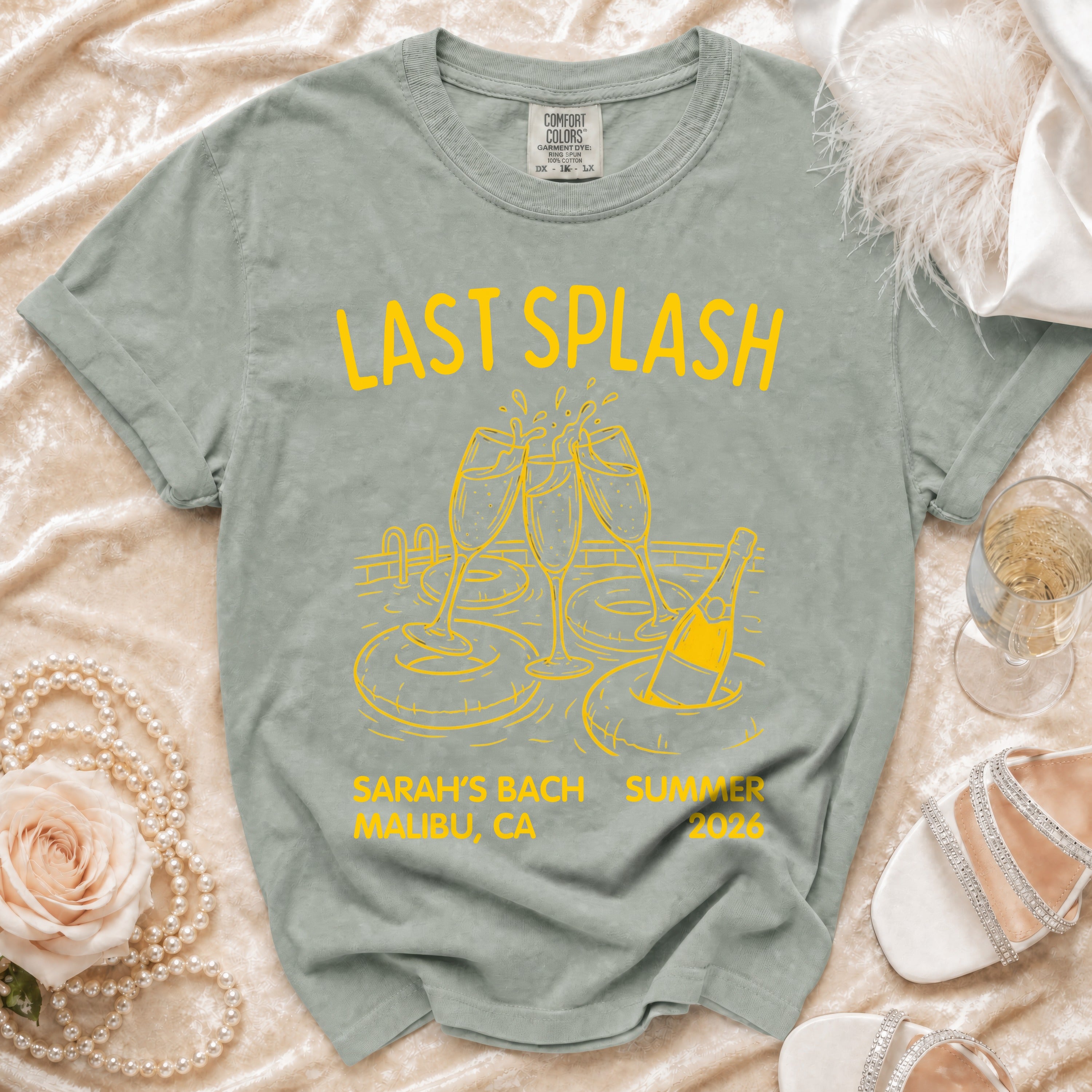 Yellow text on gray t-shirt: "Last Splash Sarah's Bach Summer Malibu, CA 2026".