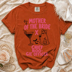 Orange t-shirt with "Mother of the Bride" and "Chief Boo-gie Officer" text.