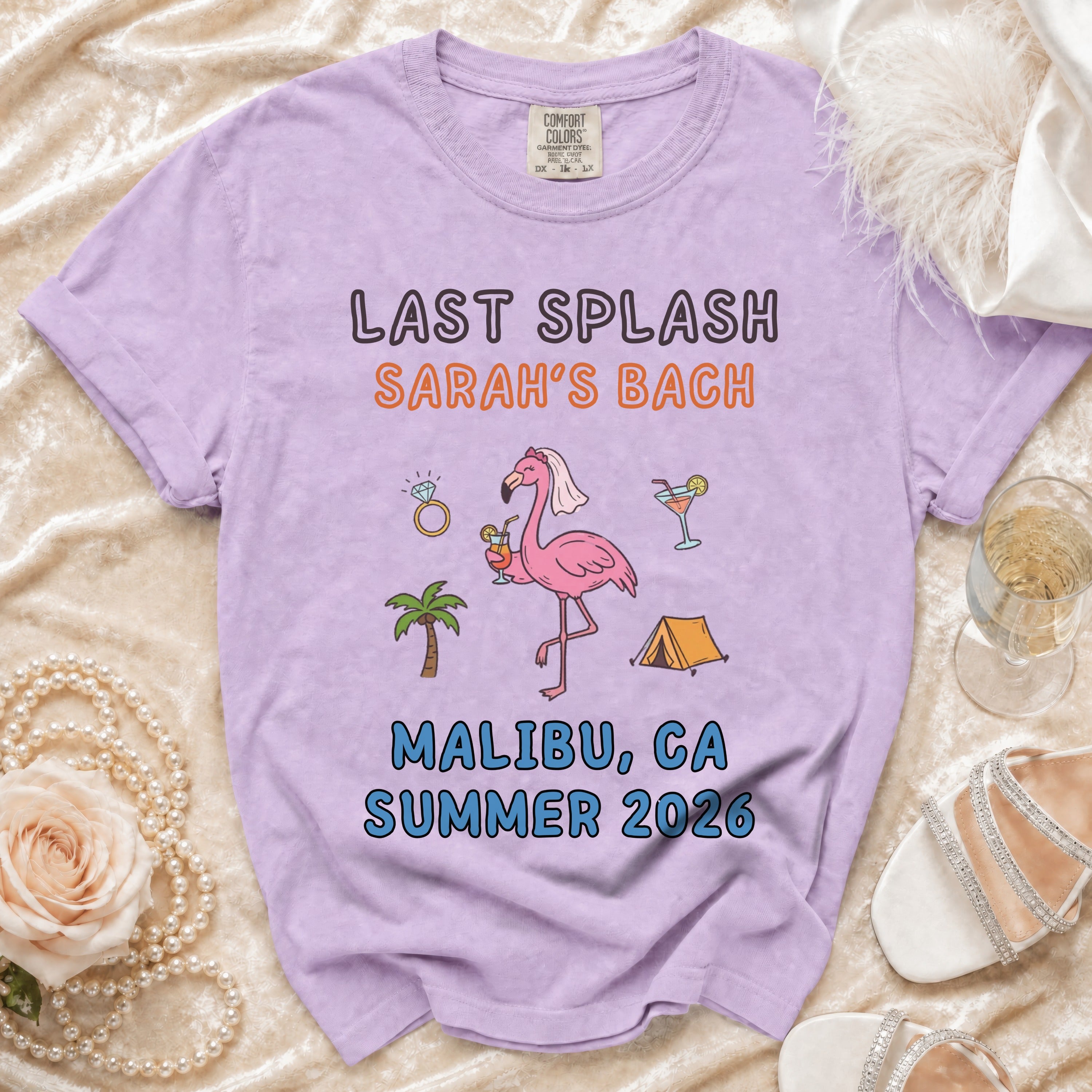 Purple t-shirt with "Last Splash Sarah's Bach Malibu, CA Summer 2026" design.