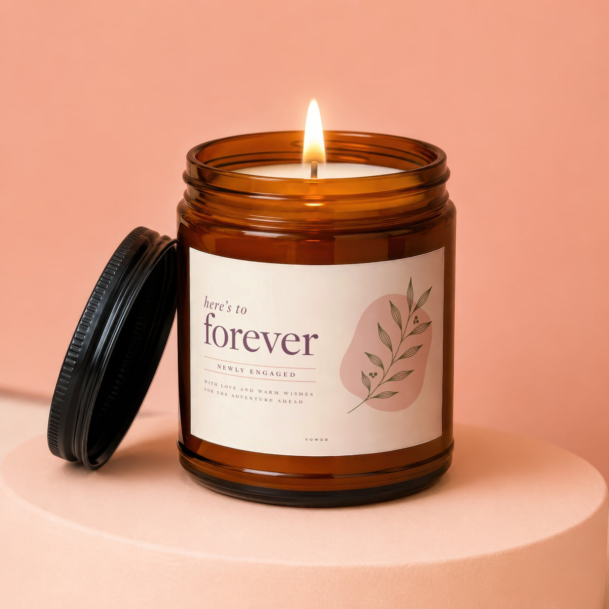Amber jar candle with "here's to forever" label for the newly engaged.