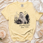 Yellow t-shirt with a skeleton bride graphic and the text "Something Wicked Said 'I Do'".