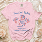 Pink t-shirt with "Her Last Rodeo" and cowboy boot, hat, horseshoe graphics.