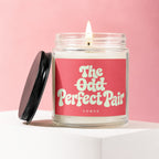 Candle with "The Odd Perfect Pair" text on a pink label.