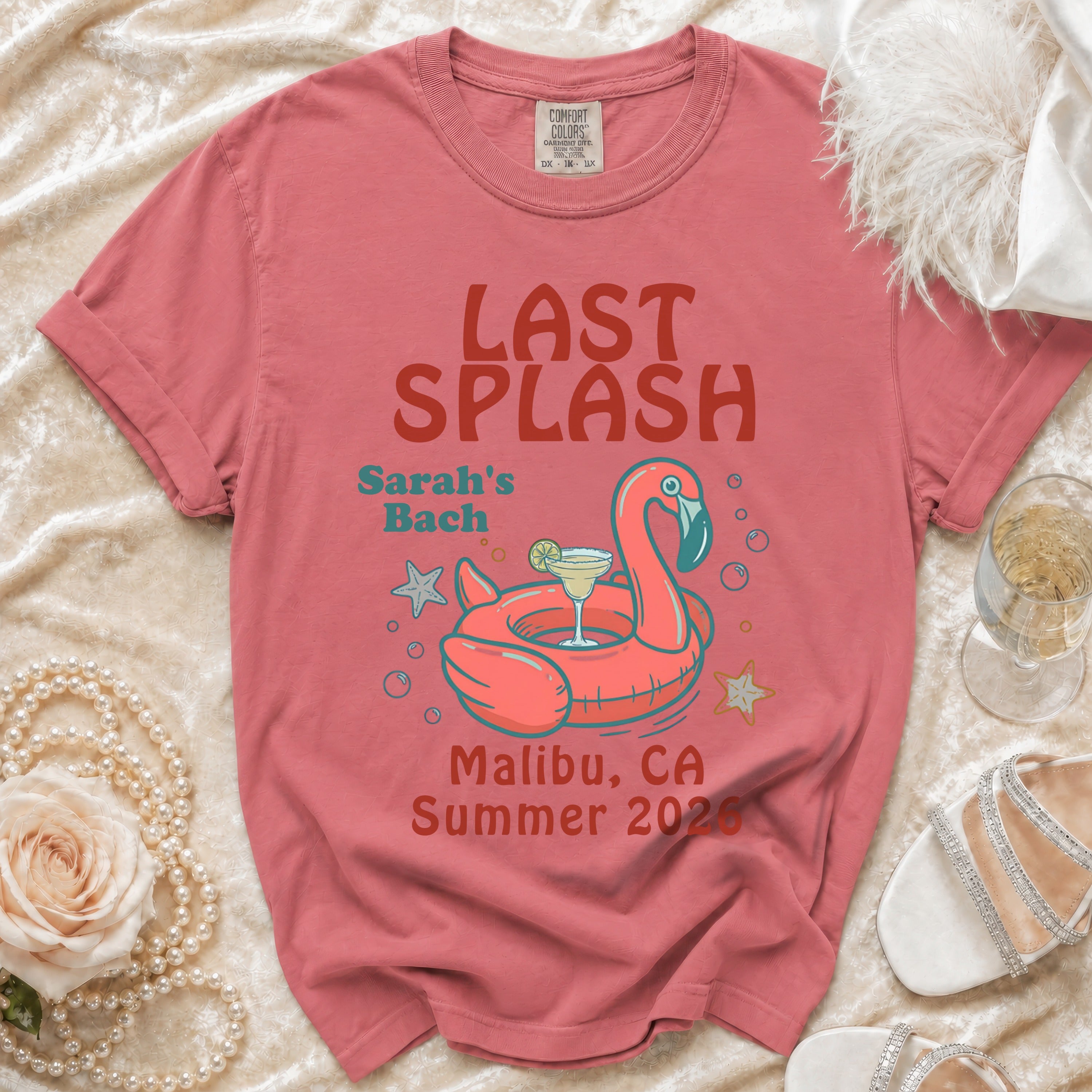 Pink t-shirt with "Last Splash Sarah's Bach Malibu, CA Summer 2026" and a flamingo float.