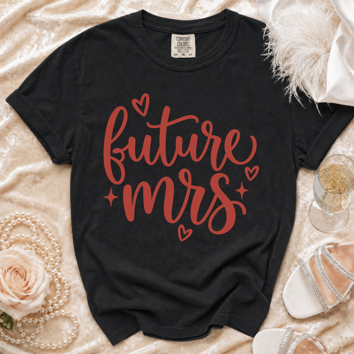 Black t-shirt with red "future mrs" text and hearts.