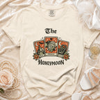 Cream graphic tee with "The Honeymoon" tarot card design and Comfort Colors tag.