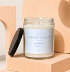 Engaged candle with label "Harper + Miles the easiest yes 06 | 14 | 27 Vowed".