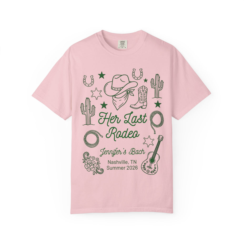 Pink t-shirt with Western motifs and "Her Last Rodeo" text for a bachelorette party.