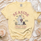 Pale yellow t-shirt with "Seaside Bride Club Til Death Do Us Party" graphic.