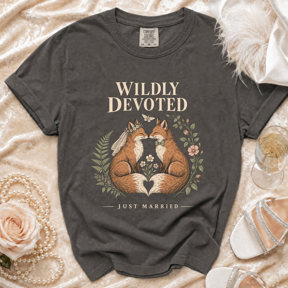 T-shirt with "WILDLY DEVOTED JUST MARRIED" text and two foxes in wedding attire.