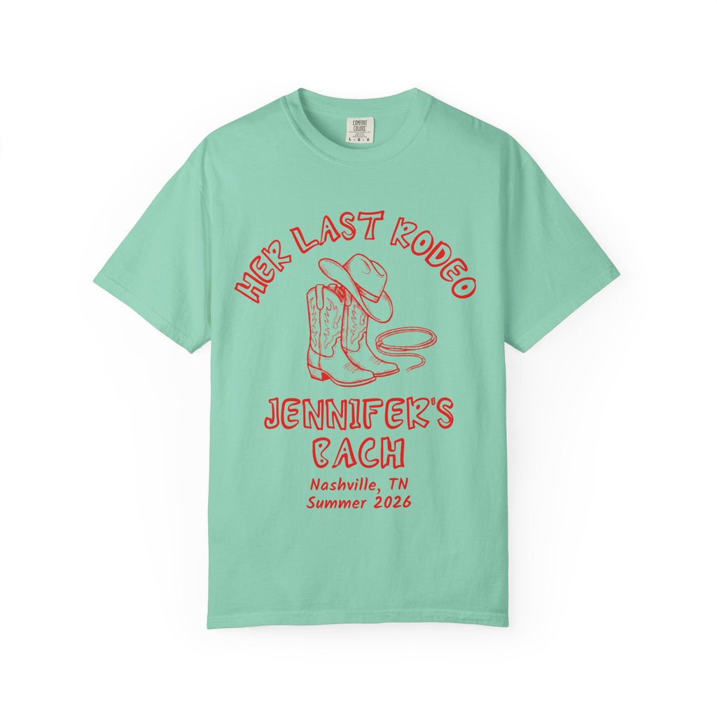 Mint green t-shirt with "Her Last Rodeo Jennifer's Bach Nashville Summer 2026" text and cowboy boots graphic.