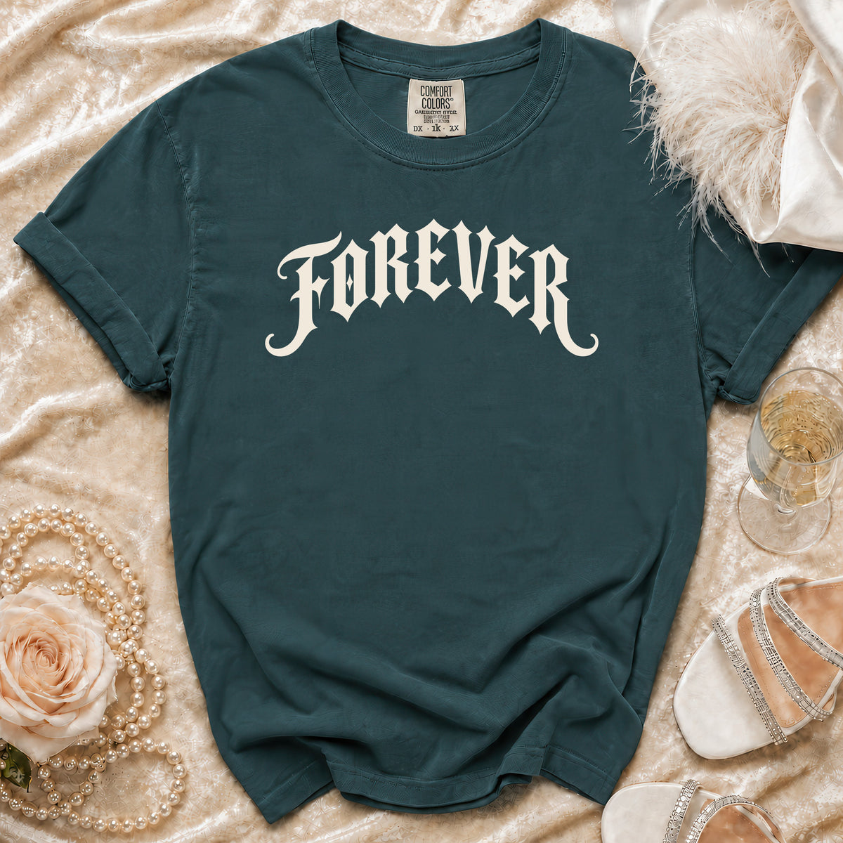 Teal Comfort Colors t-shirt with "FOREVER" in gothic font, accented with pearls and shoes.